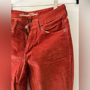 NWOT red/orange corduroy jeans. Never worn, size 4/27R